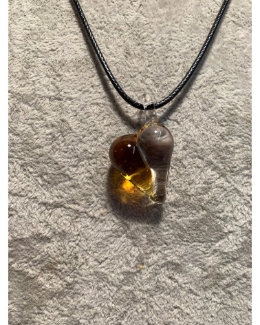 Pendentif Cœur transparent et ambre.